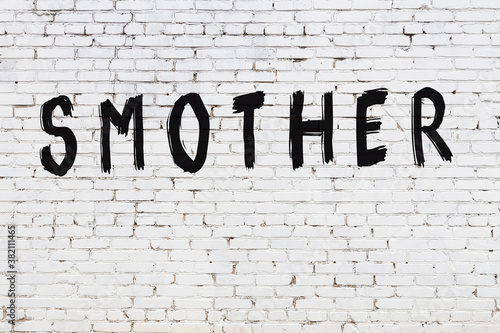 Photography Inscription smother painted on white brick wall