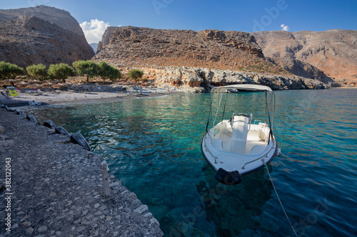 Fototapeta Naklejka Na Ścianę i Meble -  Marmara beach with Aradena Gorge in the distance. Crete, Greece.