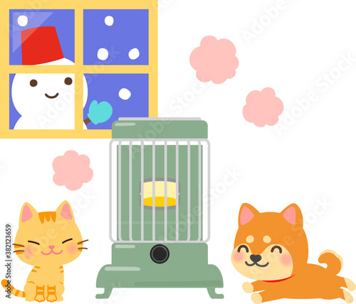 レトロなストーブで暖まる猫と犬