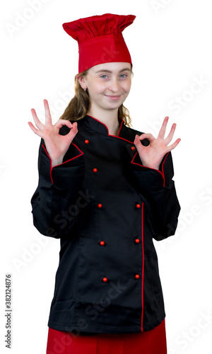Laughing young female cook apprentice