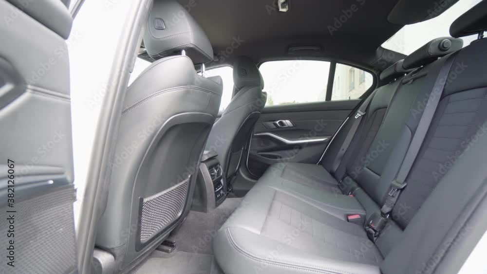 Backseats in the black interior of a modern car Backseats in the black interior of a modern car