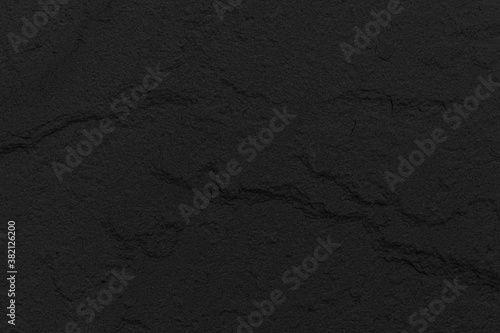 Black cladding stone texture and seamless background