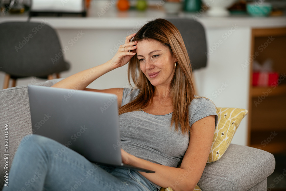 Young woman having video call. Beautiful woman enjoying at home... Young woman having video call. Beautiful woman enjoying at home...