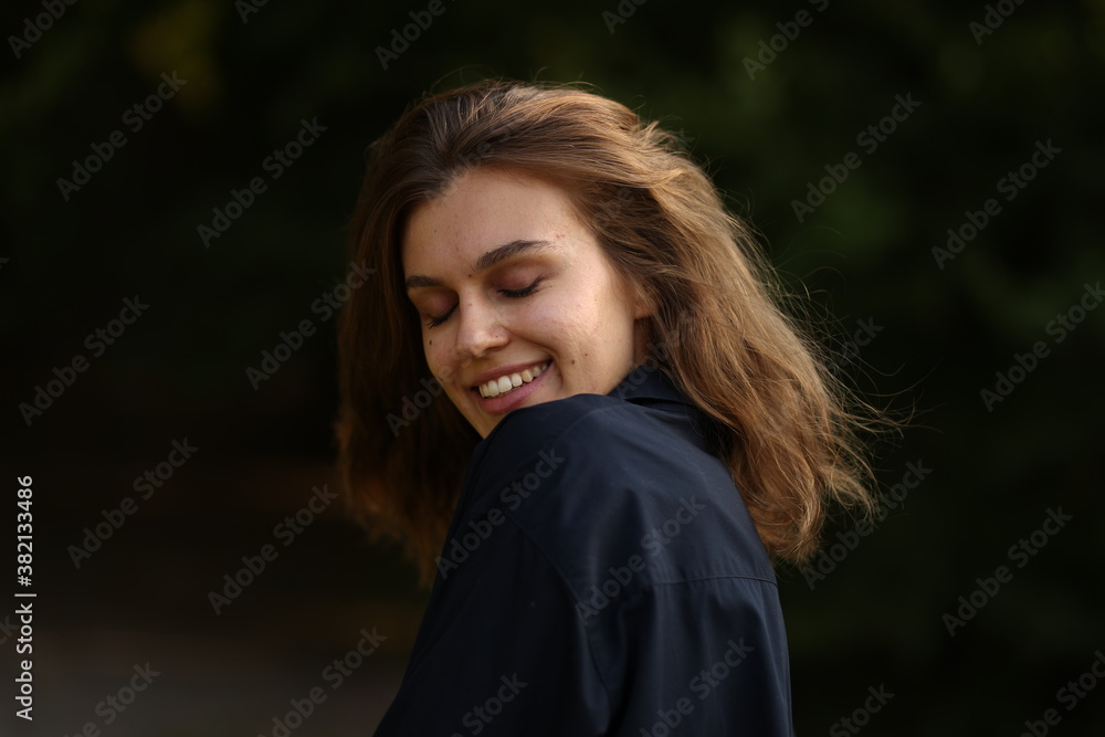happiness on the face of a young girl happiness on the face of a young girl