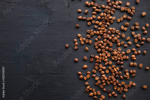 Coffee beans roasted on a black background