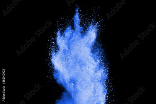 Blue powder particle splash isolated on black background.