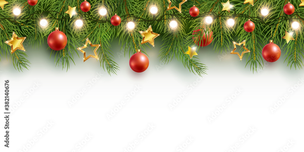 Christmas tree branches on white background as a border or