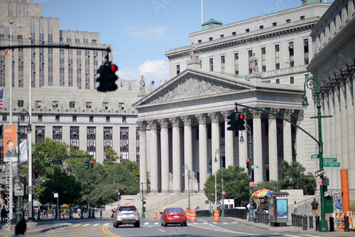Photography Facade of New York State Supreme Court Building with people around in Manhattan