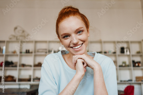 Close up of an attractive young redheaded woman