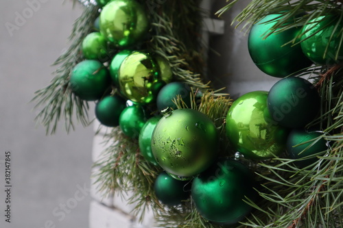 Beautiful green decorative baubles in the headdress