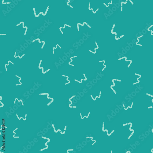 Green Jelly worms candy icon isolated seamless pattern on green background. Vector.