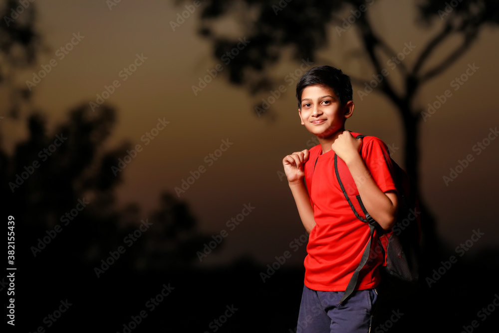Cute indian child with sack bag on street Cute indian child with sack bag on street