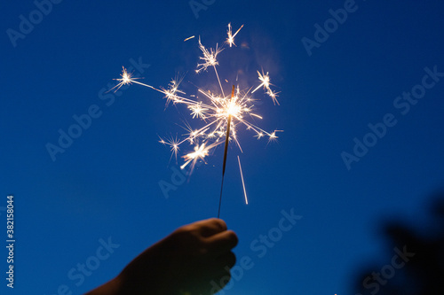 hand holding sparkler