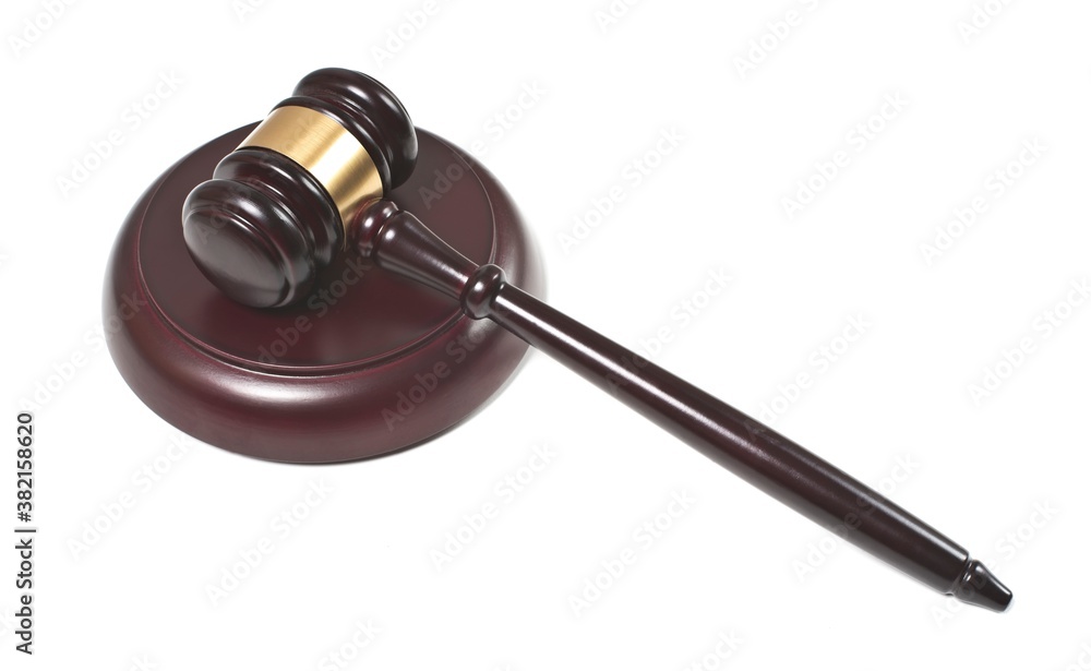 Wooden gavel and sound block isolated on white background. High angle view with copy space. Wooden gavel and sound block isolated on white background. High angle view with copy space.
