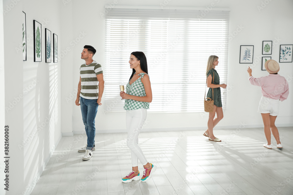 Fototapeta premium Group of people at exhibition in art gallery