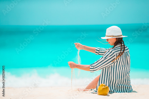 Fototapeta Naklejka Na Ścianę i Meble -  Young beautiful woman on beach tropical vacation