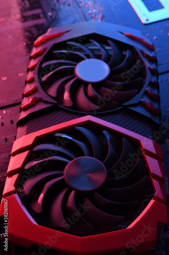 Принти на полотні Computer game graphics card, videocard with two coolers on circuit board ,motherboard background