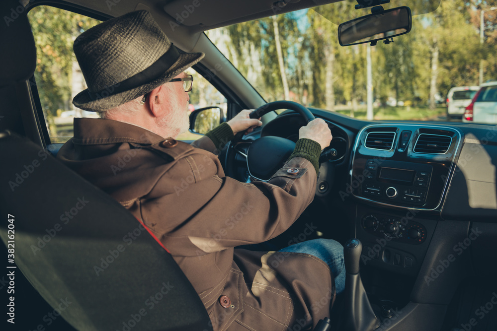 Photo of pensioner grandpa drive sit seat look roadway hold steering wheel wear brown jacket cap specs inside car Photo of pensioner grandpa drive sit seat look roadway hold steering wheel wear brown jacket cap specs inside car