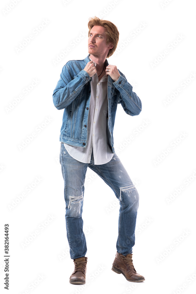 Handsome confident stylish man getting dressed and looking up thoughtfully. Full body isolated on white background. Handsome confident stylish man getting dressed and looking up thoughtfully. Full body isolated on white background.