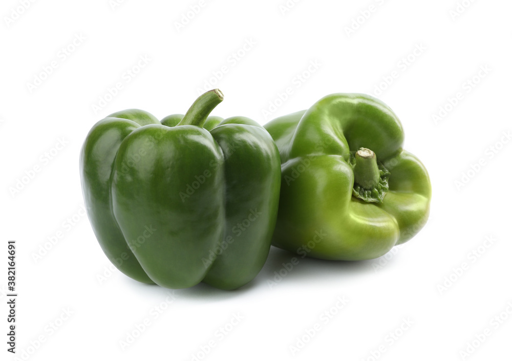 Fresh ripe green bell peppers isolated on white Fresh ripe green bell peppers isolated on white