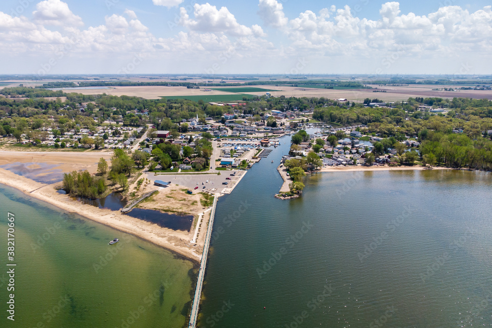 Drone shot of small coastal town in Michigan, USA on a summer day
