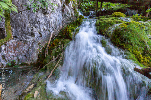 Picture of a waterfall in the Plitvice Lakes National park in Croatia with long exposure during daytime