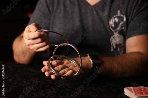 close up of a magician practicing a ring trick © Gambit