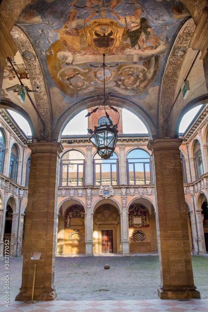 BOLOGNA, ITALY - MARCH 15, 2014: Ceiling and atrium from the entry to external atrium of Archiginnasio. 