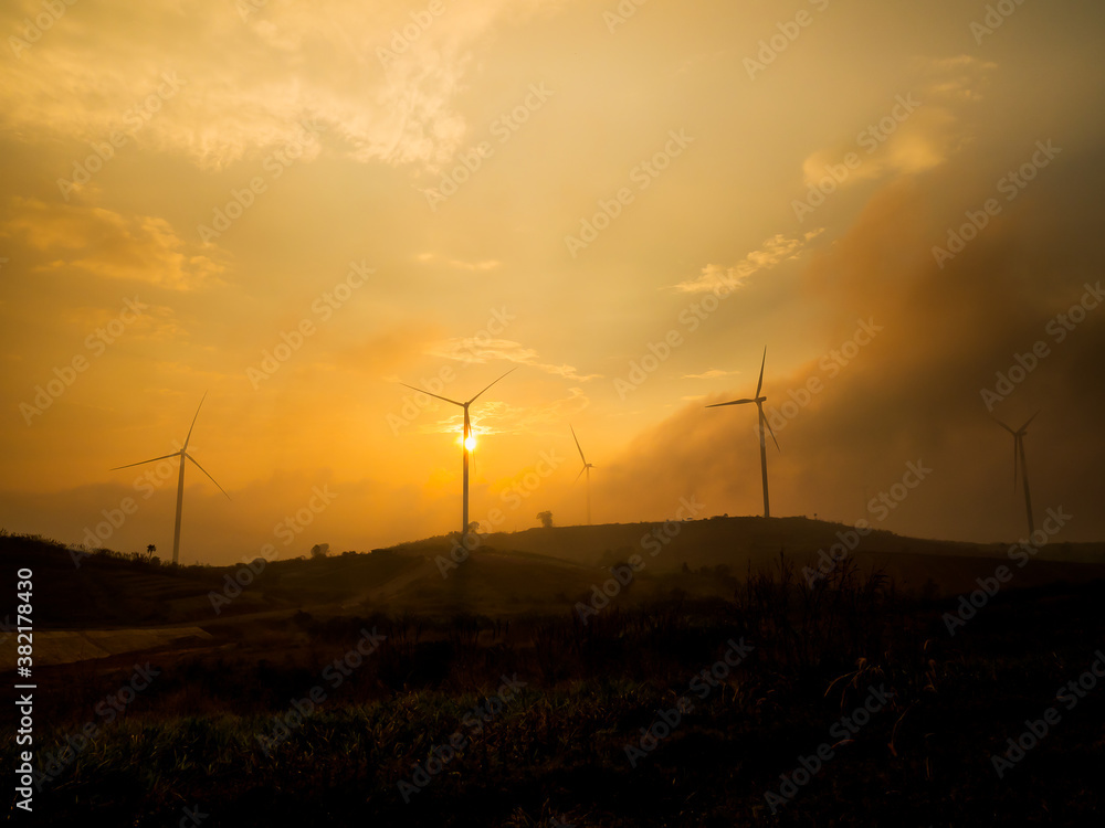 Obraz premium Many wind turbines are located on the hill to generate clean energy, Sent to use in the city