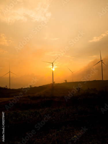 Many wind turbines are located on the hill to generate clean energy, Sent to use in the city