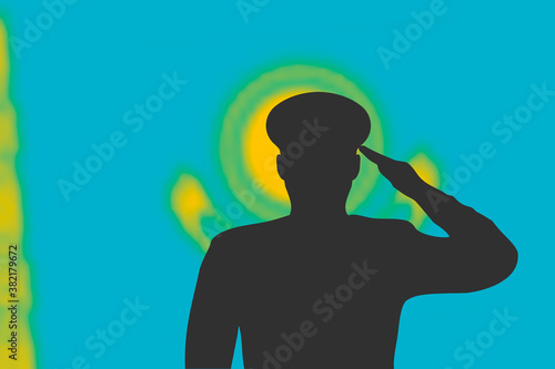 Solder silhouette on blur background with Kazakhstan flag.