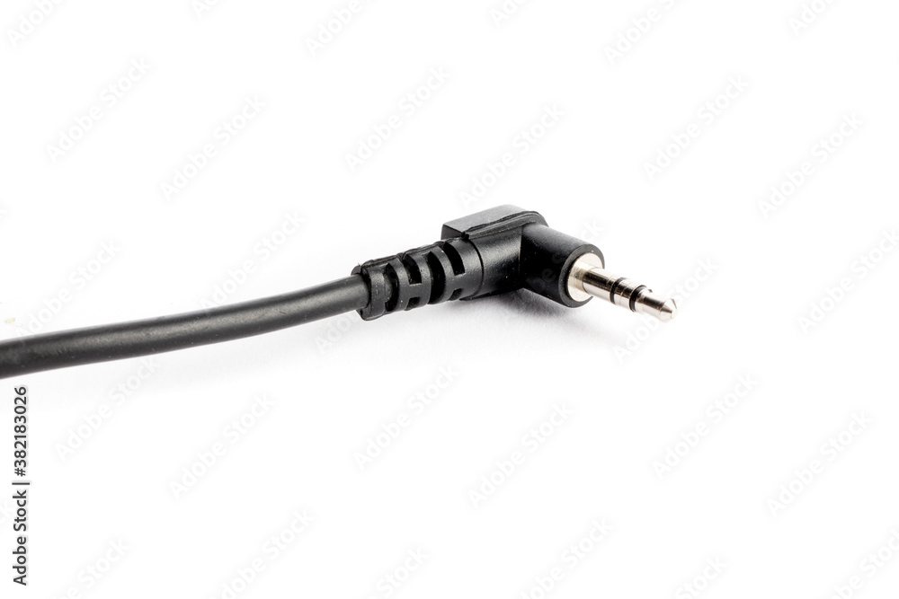 macro closeup of a one eighth inch 3.5 mm angle headphone audio plug macro closeup of a one eighth inch 3.5 mm angle headphone audio plug