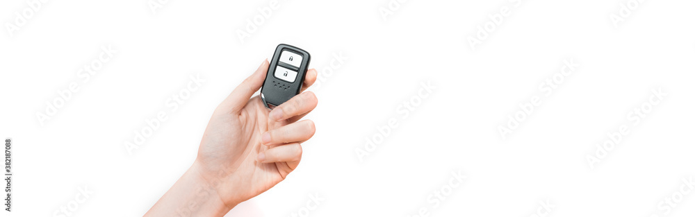 web banner new wireless car key in beauty woman hand with white background web banner new wireless car key in beauty woman hand with white background