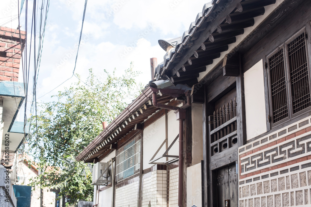 The eaves of Korean traditional houses on the blue sky background.