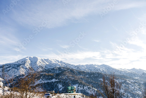 Winter snow landscape near Beldersay resort in Uzbekistan, Tien Shan Mountains