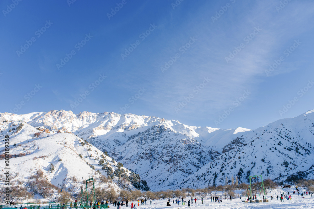 Chimgan ski resort in winter on a Sunny clear day. Chimgan mountain in Uzbekistan