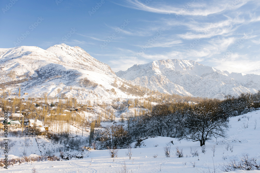 Winter beautiful mountain landscape of the Tianshan mountain system in Uzbekistan on a clear Sunny day