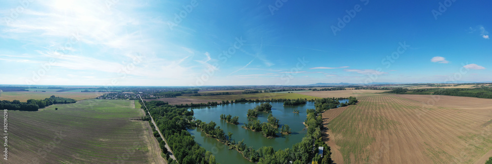 Aerial view of a lake in the village of Komjatice in Slovakia