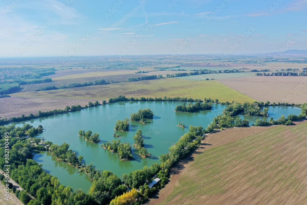 Aerial view of a lake in the village of Komjatice in Slovakia Aerial view of a lake in the village of Komjatice in Slovakia