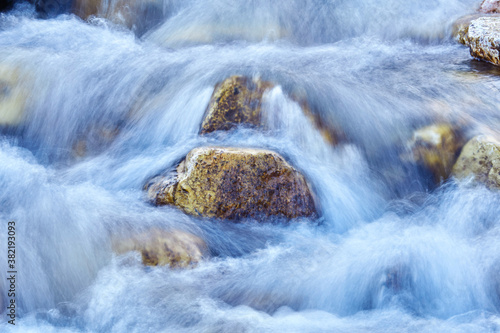 fragment of a waterfall, water jets are blurred in motion
