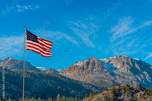 Gull Lake in California flies an American flag above the lake.