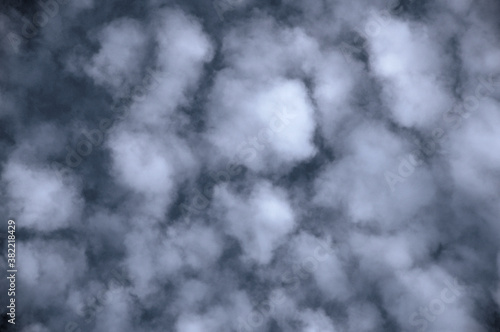 Mackerel sky: altocumulus "sheep clouds" over the Swiss Alps in Autumn
