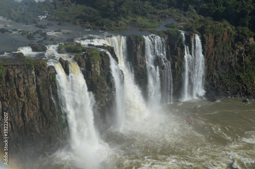Rainbows over the mighty and powerful Iguzu (Iguacu) Waterfalls between Brazil and Argentina © ChrisOvergaard