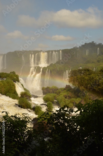 Rainbows over the mighty and powerful Iguzu  Iguacu  Waterfalls between Brazil and Argentina