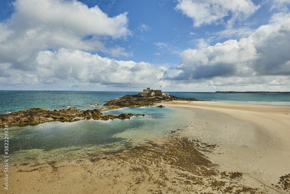 Fort National on the beach at low tide in Saint Malo, Brittany, France Fort National on the beach at low tide in Saint Malo, Brittany, France
