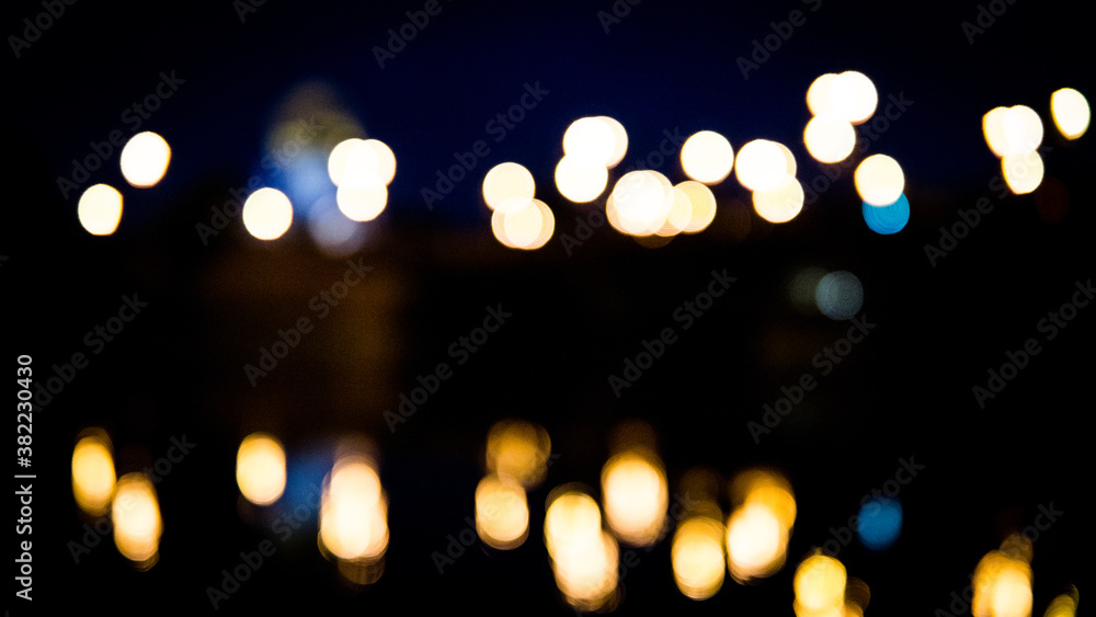 Blurred lights in the city by the River. Photo taken in Poland, Gorzow. - obrazy, fototapety, plakaty 