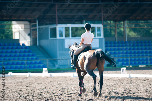 Young lady riding a horse. Training before competition © AnnaElizabeth