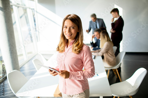 Young business woman using ...