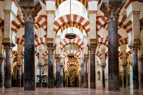 The red and white stone Arches of Mezquita de Cordoba (Great Mosque) (Cordoba Cathedral), Cordoba, Andalusia, Spain