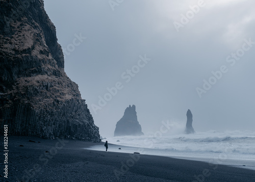Reynisfjara black sand beach on a stormy winter morning. Southcoast of Iceland.